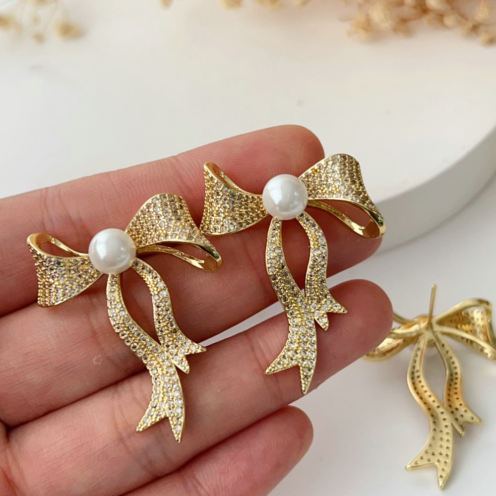 Pave bow zircon earrings