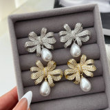 Pave bow pearl earrings