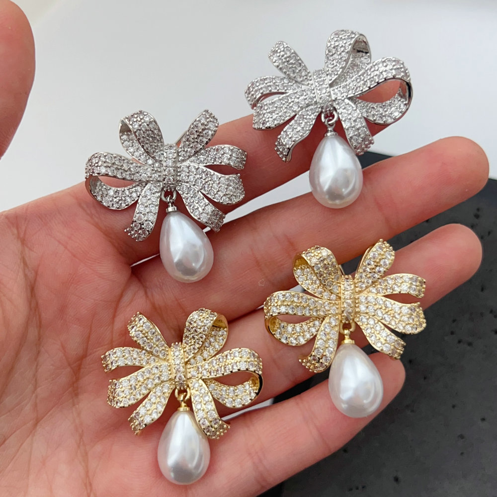 Pave bow pearl earrings