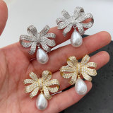 Pave bow pearl earrings