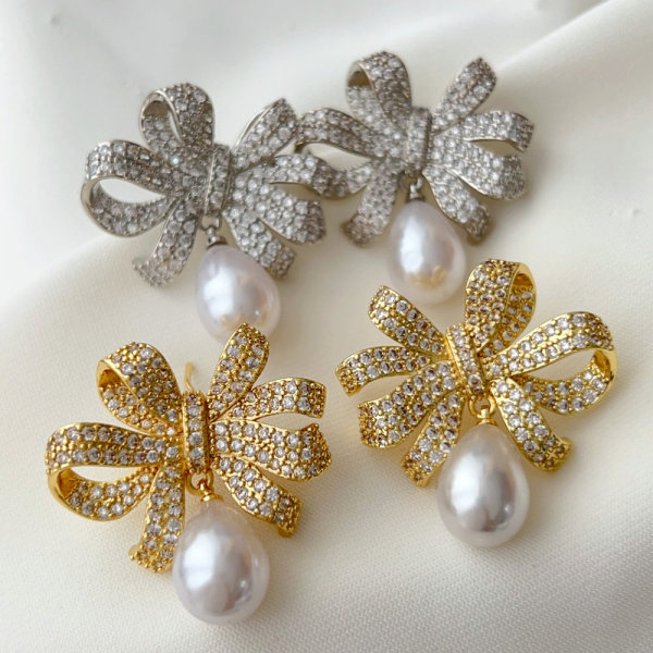 Pave bow pearl earrings