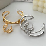 Pave nail cross cuff with ring