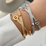 Pave nail cross cuff with ring
