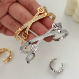 Pave nail cross cuff with ring
