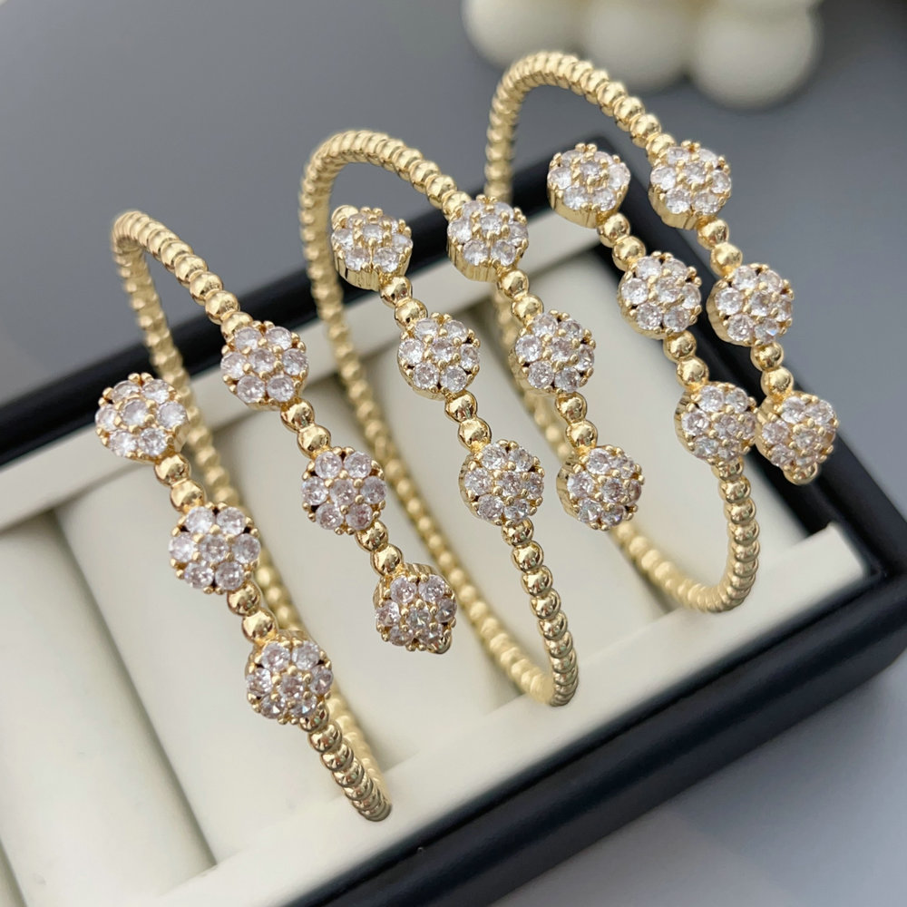 Pave zircon flower beaded cuff