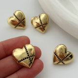 Metal cross heart earrings