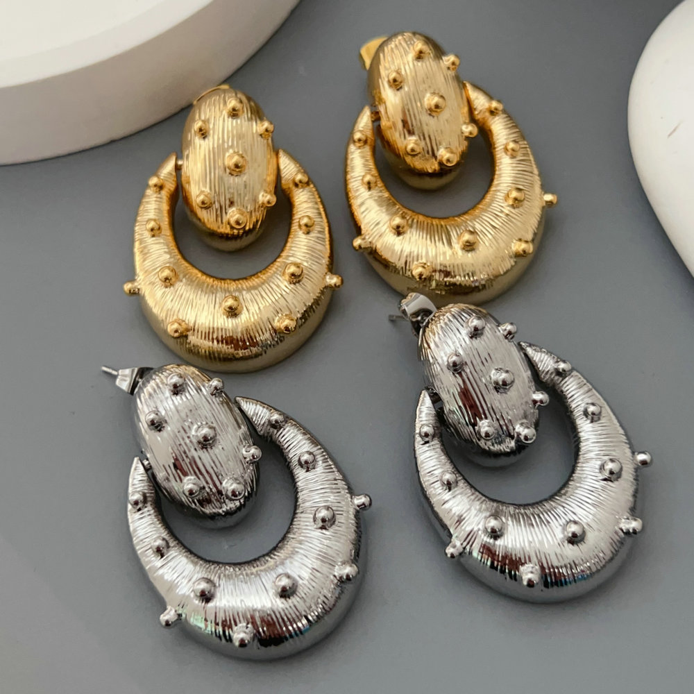 Metal rivet earrings