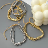Gold ball heart bracelet