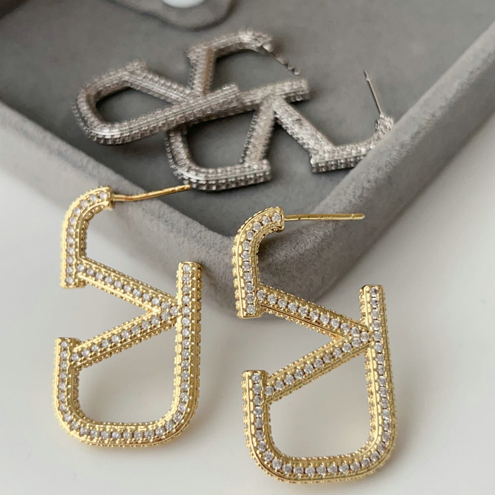 Pave zircon brand earrings