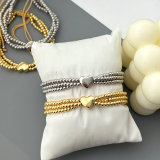 Gold ball heart bracelet