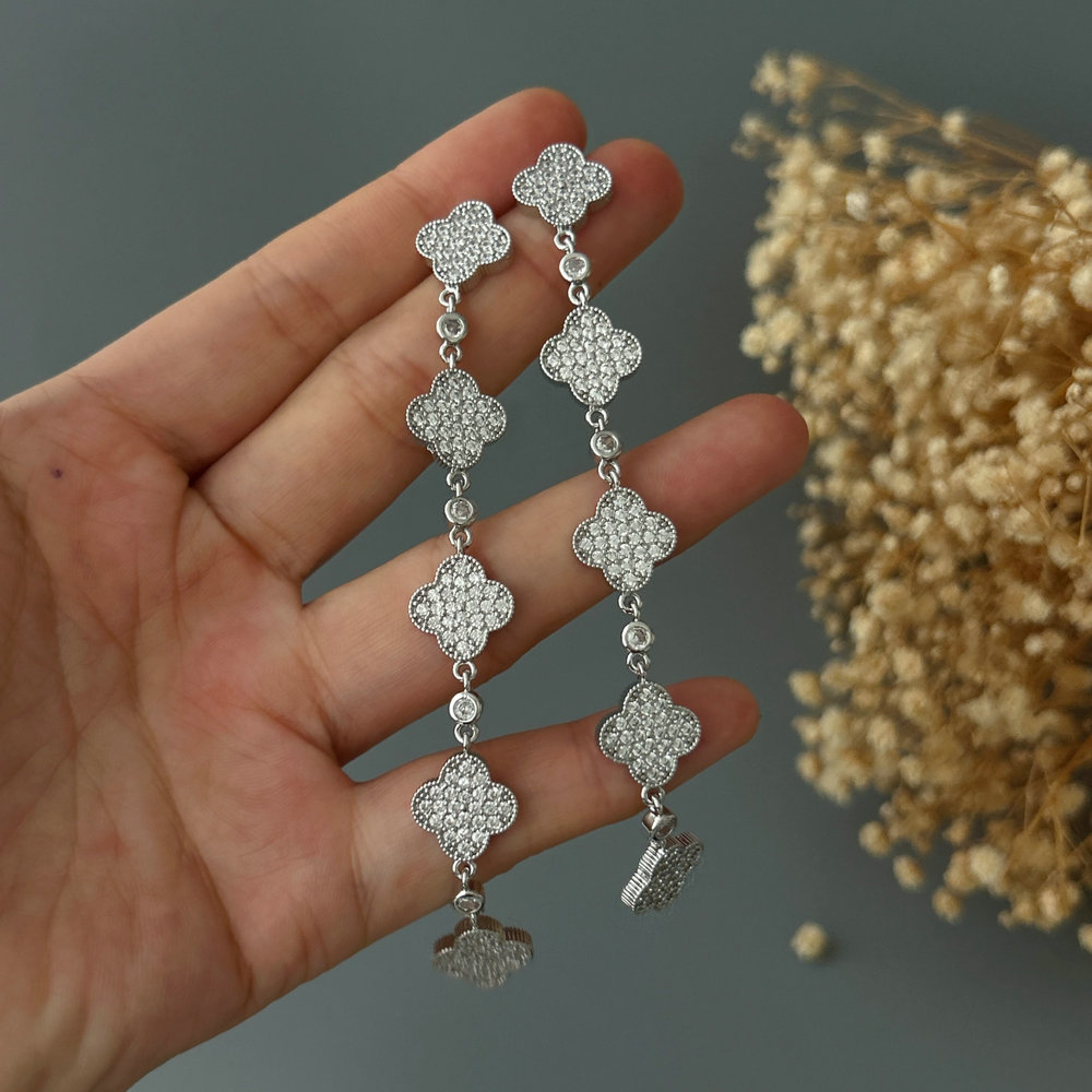 Long pave clover earrings