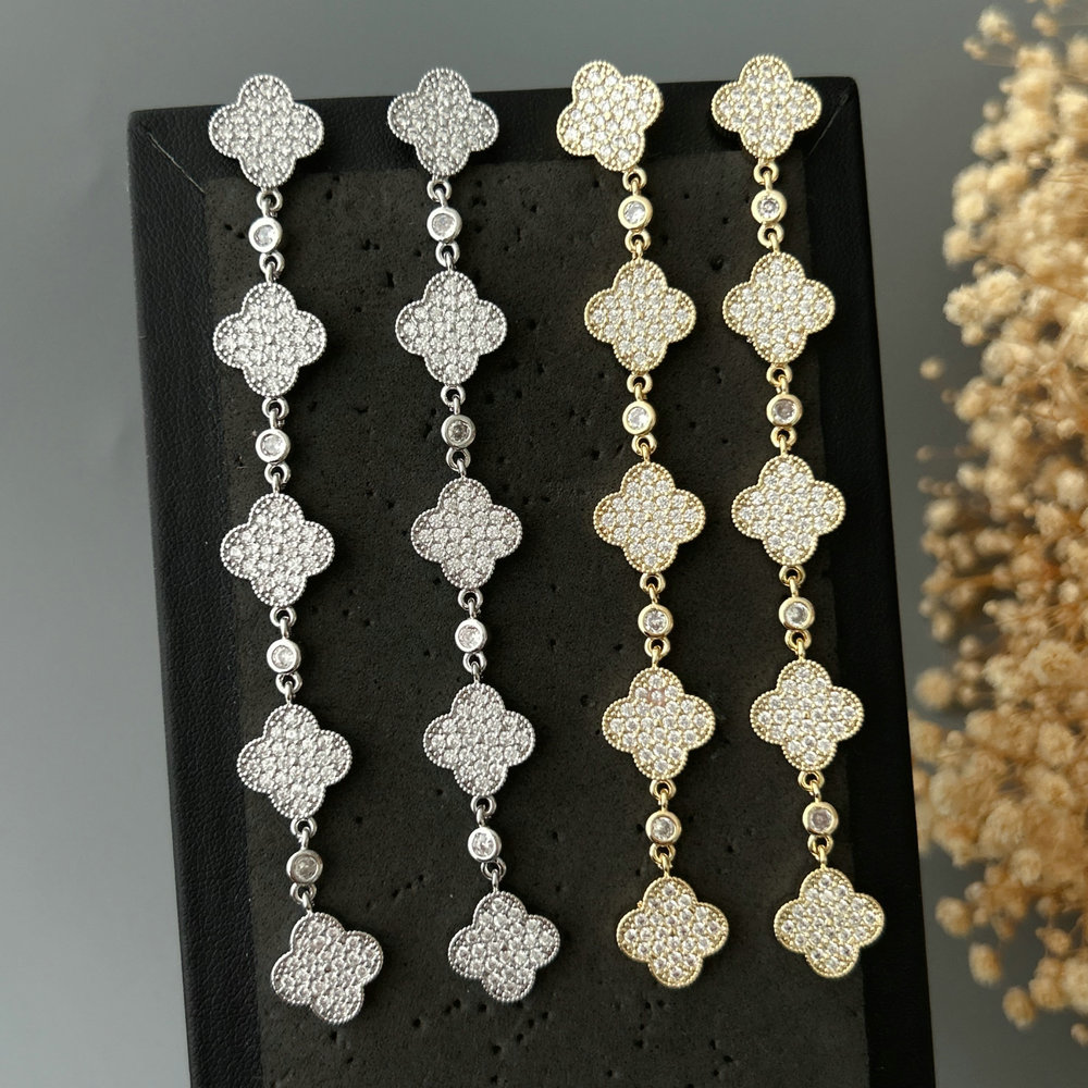 Long pave clover earrings