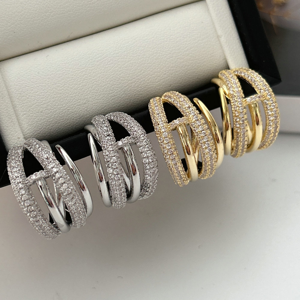 Pave zircon nail earrings