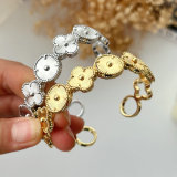 Metal clover cuff