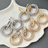 Pave circle charm earrings