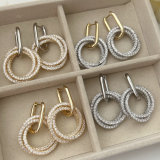 Pave circle charm earrings