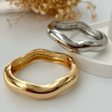 Chunky metal wave bangle