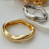 Chunky metal wave bangle