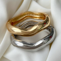 Chunky metal wave bangle