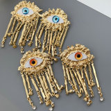 Chunky evil eye tassel earrings