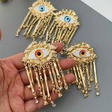Chunky evil eye tassel earrings