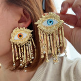 Chunky evil eye tassel earrings