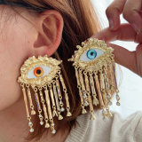 Chunky evil eye tassel earrings