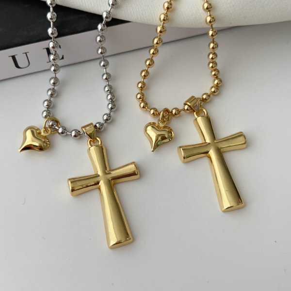 Cross pendant beaded dot chain necklace