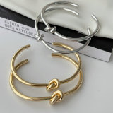 Metal knot cuff