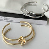Metal knot cuff