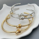 Metal knot cuff