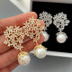 Pave flower pearl drop earrings