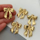 Metal bow charm