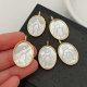 shell religious pendant
