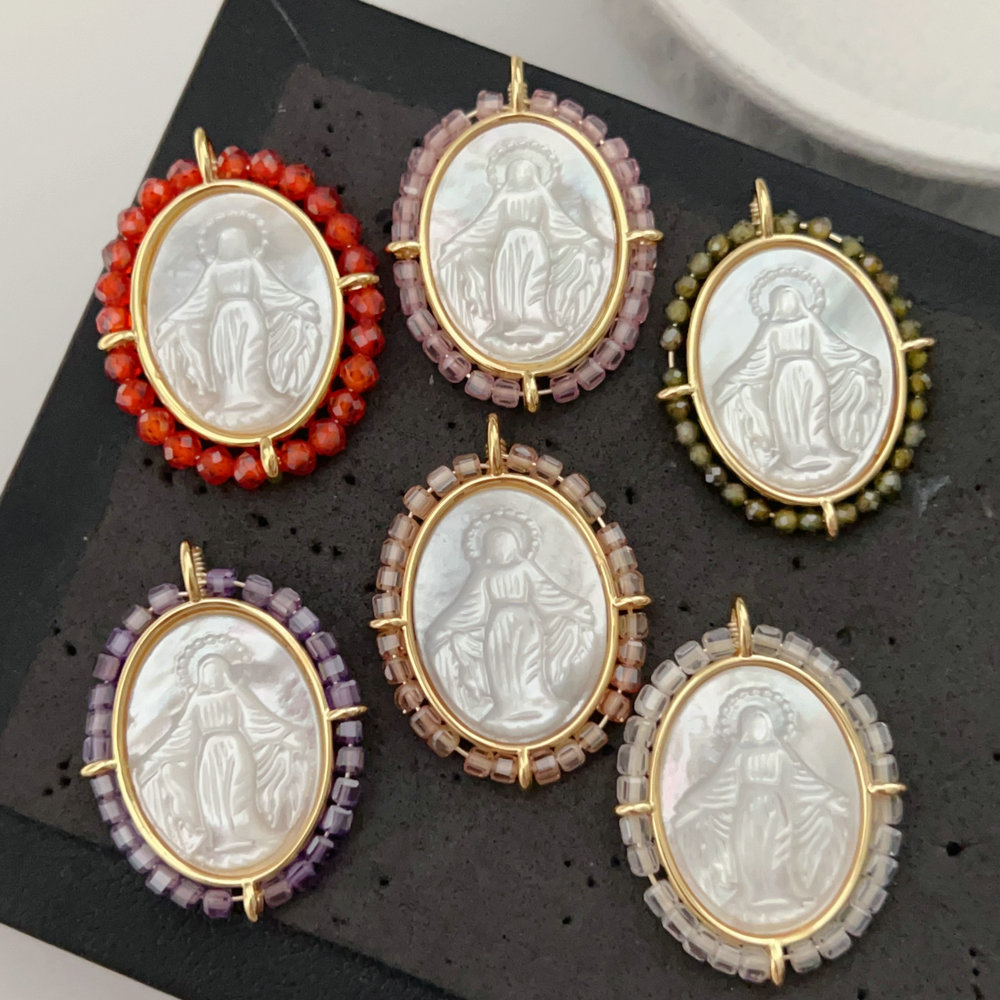 Oval shell religious pendant
