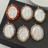 Oval shell religious pendant