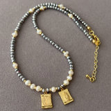 grey chinese crystal necklace with charm