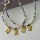 grey chinese crystal necklace with charm