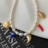Fresh water pearl necklace with fish charm