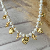 Shell pearl necklace with heart charm