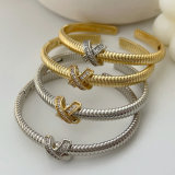 Cross bangle