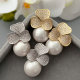 Pave flower pearl drop earrings