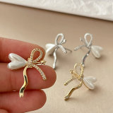 Pave bow earrings