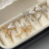 Pave bow earrings