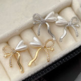 Pave bow earrings
