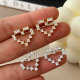 Pave zircon heart earrings