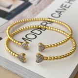 Gold ball heart bangle