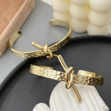 Metal knot cuff