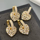 Pave heart drop earrings