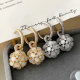 Cat eye drop ball earrings